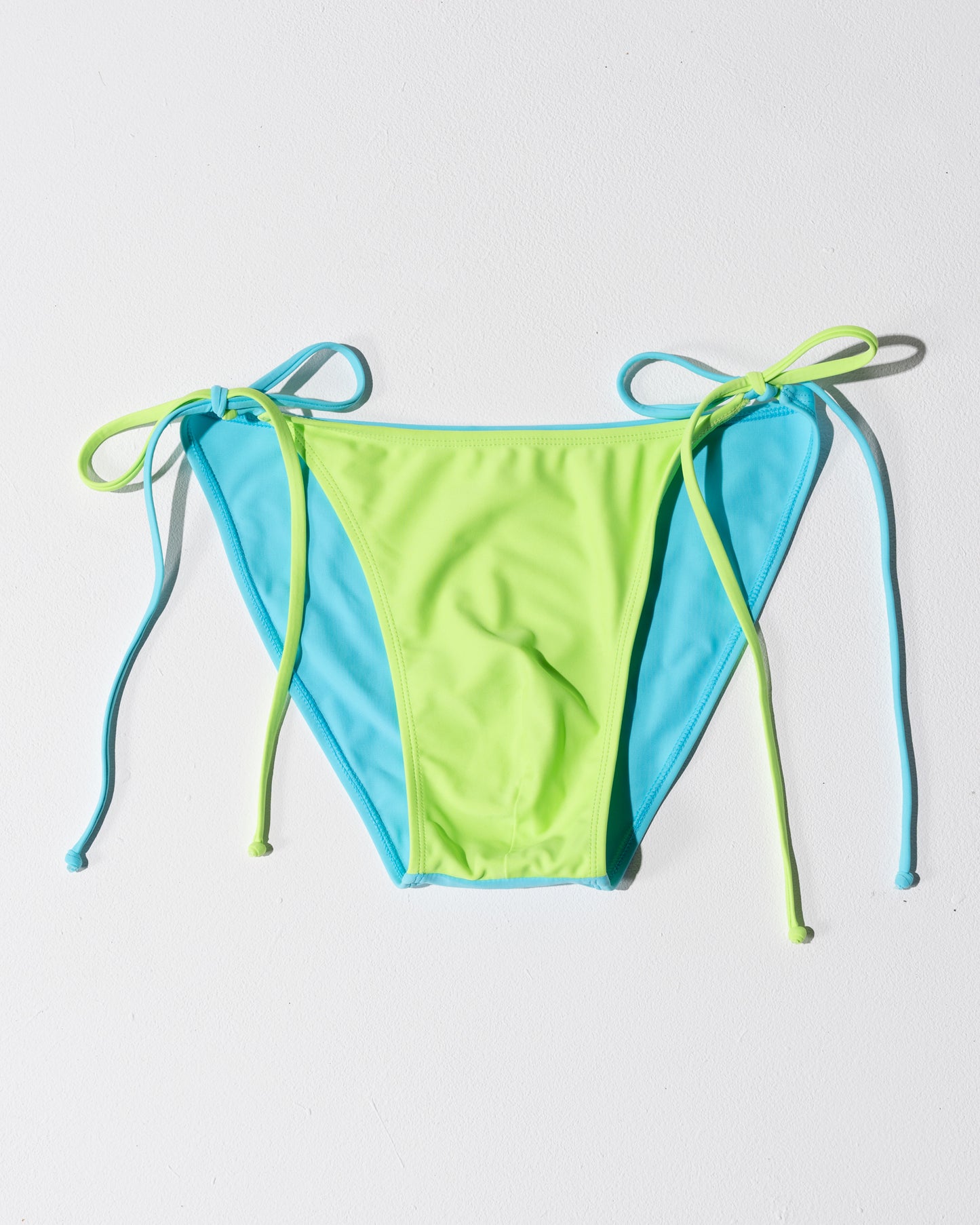 close up of men's tie up swim brief