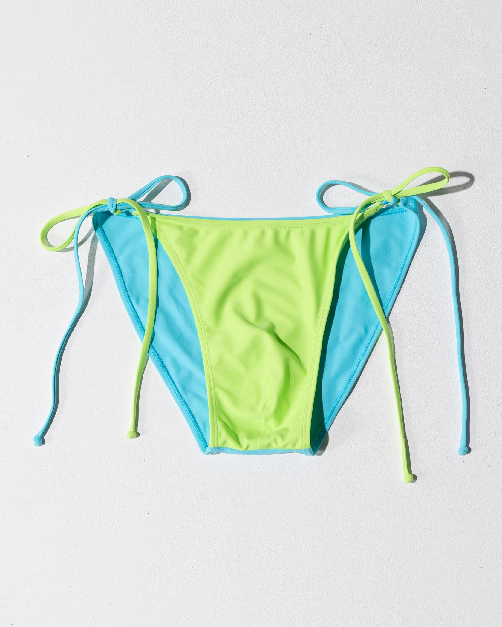 close up of men's tie up swim brief